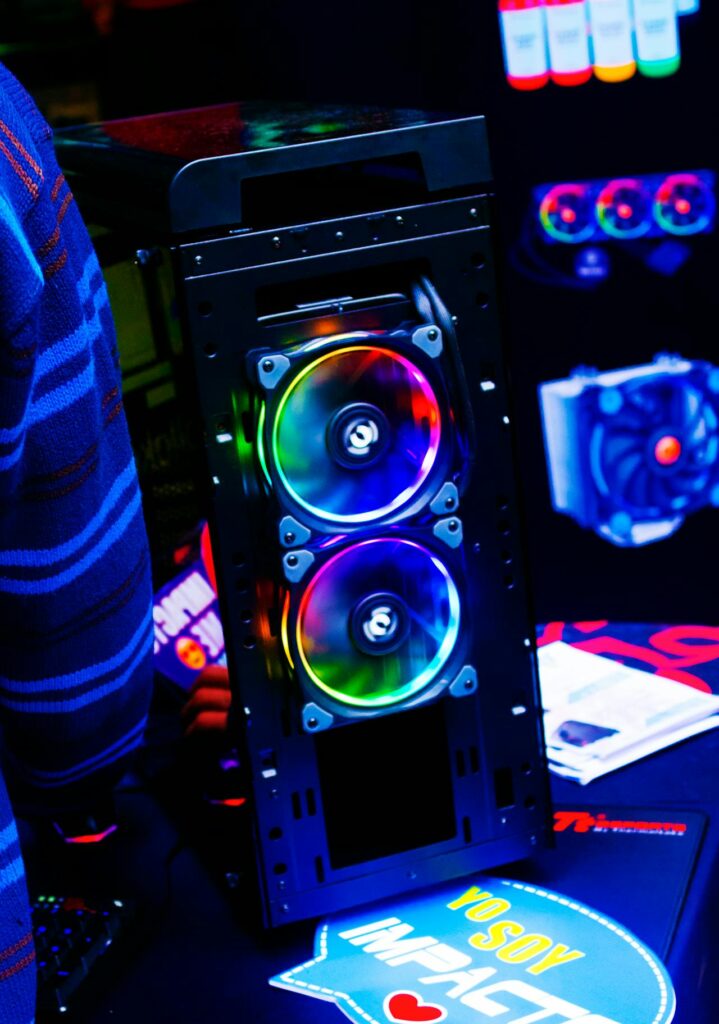 MXZ Gaming Desktop with Ryzen 5 5600G APU, shown in a compact black case with RGB lighting – promoted as the best low-cost gaming system with integrated graphics.